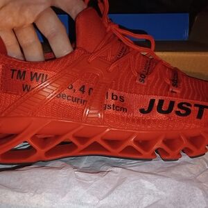 Red Athletic Sneakers with Black Text